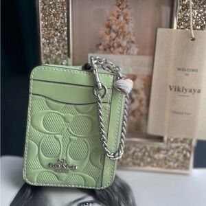 NWT coach Zip Card Case In
Signature Leather With Heart Charm